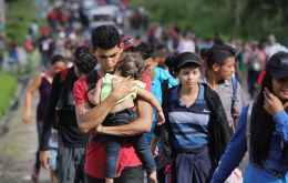 Up to 3,000 migrants, according to organizers’ estimates, crossed from Honduras into Guatemala on a trek northward after a standoff with police in riot gear